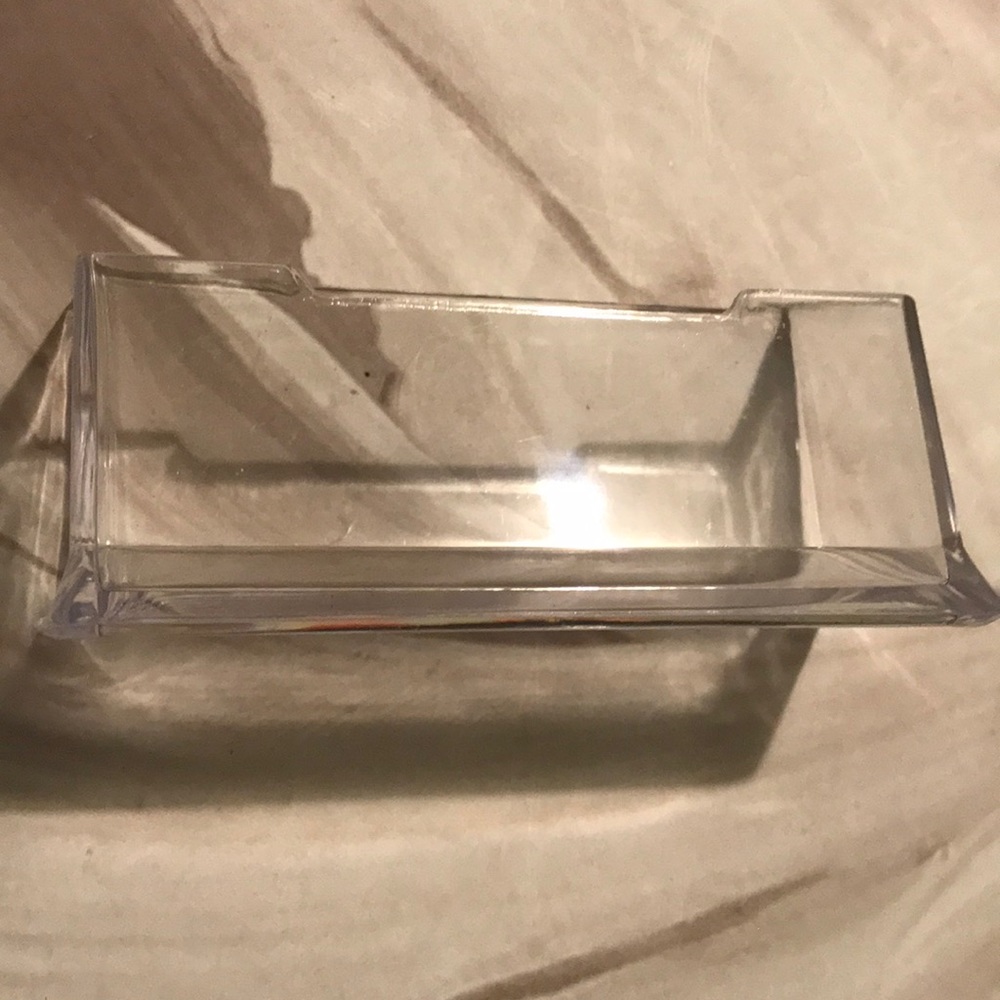 Plastic container for business cards. Actually Nice looking too.